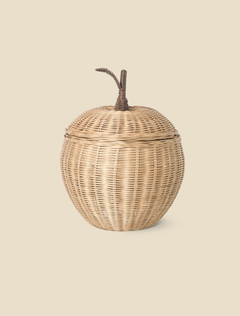 A Braided Apple Basket - Large shaped like an apple, featuring a lid and a stem, set against a pale beige background.