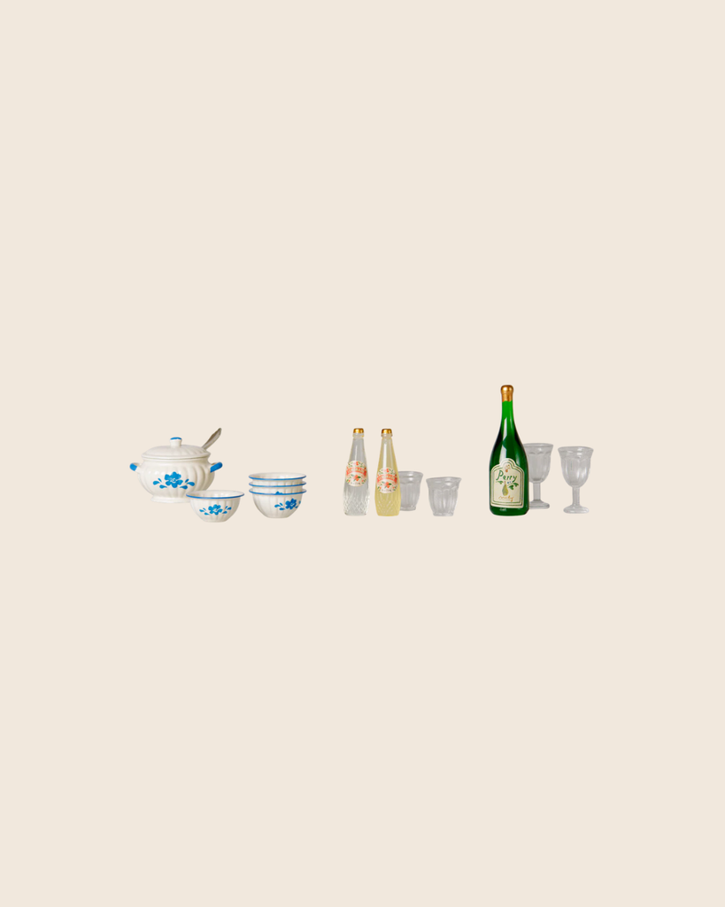 The PRE-ORDER: Maileg Soup Set, Mouse (Estimated Arrival Early November) features ceramic bowls, a blue floral teapot, two drink bottles, a green wine bottle, and four assorted glasses arranged on a beige background.