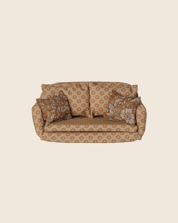 The PRE-ORDER: Maileg Sofa Bed, Mouse, Large - Ocher features vintage charm with ocher upholstery and two matching pillows—ideal as toy furniture or a cozy mice bed for your miniature scene. Estimated arrival early October.