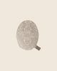 PRE-ORDER: Maileg Lace Rug, Mouse—an oval, intricately crocheted off-white lace rug with fabric tag. Ideal for dollhouse decor or as a small accessory. Displayed on a beige background. Estimated arrival mid September.
