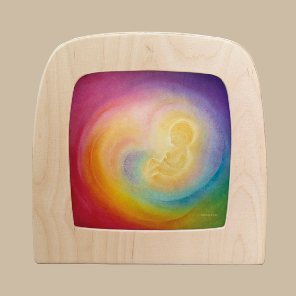 The "Silhouette Only - Womb for Toverlux Lamp" features a glowing baby curled in a fetal position, surrounded by swirling rainbow hues on a pastel background—a magical accent for your home decor.