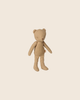 The PRE-ORDER: Maileg Teddy Junior - Dark Sand (Estimated Arrival Mid November) is a charming teddy bear with stitched features, made from soft cotton in a simple, classic style and shown upright against a light beige background.