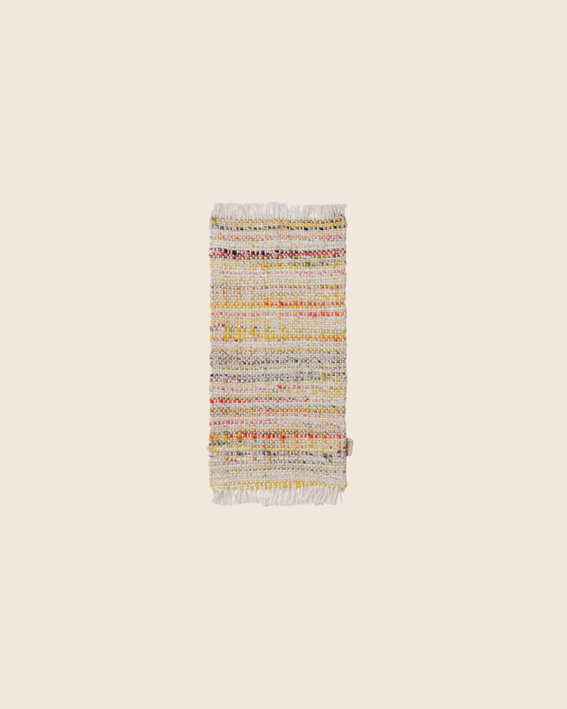 PRE-ORDER: Maileg Rug, Miniature, Medium - Multi Stripe—a small rectangular woven rug with multicolored stripes and fringed edges, perfect as a vibrant living room accent. Estimated arrival mid September.