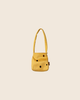 PRE-ORDER: Maileg Cheese Bag, Medium Mouse—A small yellow fabric bag with a single handle and playful black cheese dots, shown on a beige background. Estimated arrival: Early November.