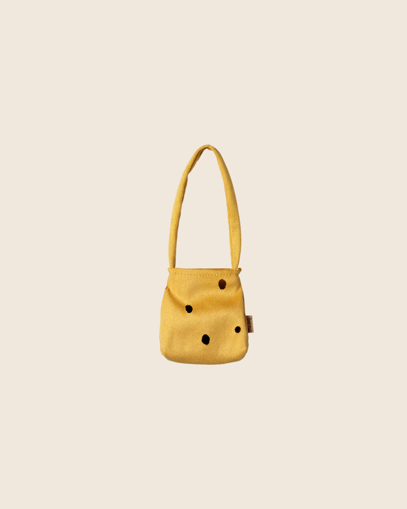 PRE-ORDER: Maileg Cheese Bag, Medium Mouse—A small yellow fabric bag with a single handle and playful black cheese dots, shown on a beige background. Estimated arrival: Early November.