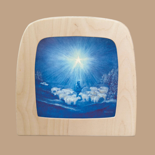 The “Silhouette Only - Guiding Star Silhouette for Toverlux Lamp” features silhouette artwork of a shepherd with sheep beneath a bright star in a blue night sky, perfectly capturing the enchanting essence of Magic Silhouettes.