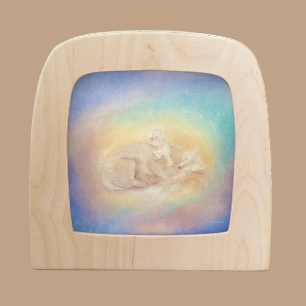 A pastel artwork depicting a polar bear cuddling two cubs, surrounded by a rainbow-hued glow on a light tan background, creates an enchanting scene on the Silhouette Only - Polar Family Silhouette for Toverlux Lamp—adding charm to any space.
