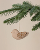 The Maileg Fabric Ornament, Bird - Winter Heart - Sand features decorative wings and hangs from a green pine branch against a beige background, adding charm to your Christmas ornament collection.