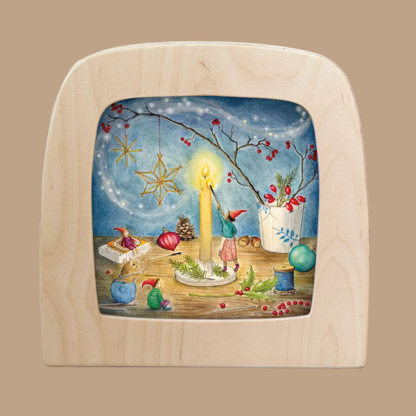 The “Silhouette Only - Preparing for Christmas Silhouette for Toverlux Lamp” features a whimsical scene of gnomes lighting a candle, surrounded by pine cones, ornaments, berries, and festive décor—all set against a blue, starry background. This charming Christmas silhouette beautifully captures the magic of the season.