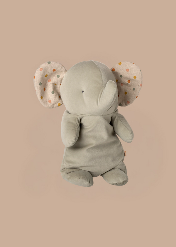 The Maileg Elephant Soft, Medium - Iron Grey is a plush toy from the Safari Friends collection, made with ultra-soft fabric and large floppy ears in a pastel polka dot pattern, shown on a plain beige background.