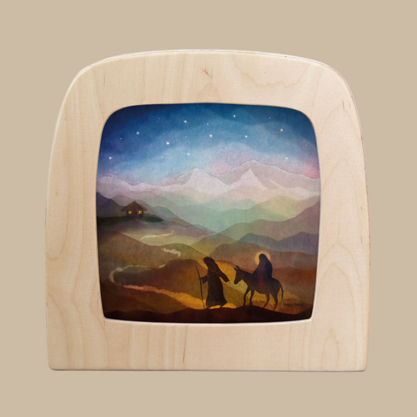 A translucent "Pilgrimage" silhouette for the Toverlux Lamp features two figures with a donkey journeying through hills under a starry sky—a magical, colorful artwork to enhance your home décor.
