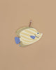The Butterfly Fish Pencil Case is yellow and cream striped, shaped like a fish with blue fins and tail, features a zipper, and has a pencil partially inside, shown on a plain beige background.