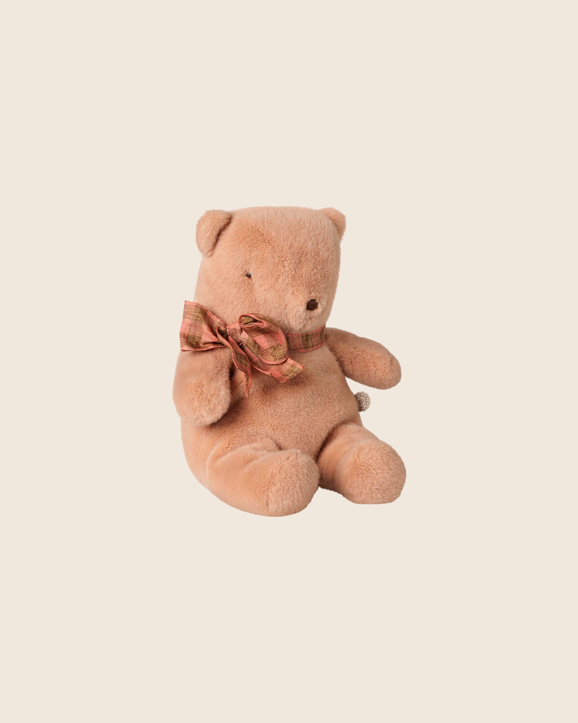 The PRE-ORDER: Maileg Teddy Bear Plush, Small - Vintage Rose (Estimated Arrival Early October) features a soft, huggable teddy bear sitting upright with a plaid ribbon bow against a plain light beige background.
