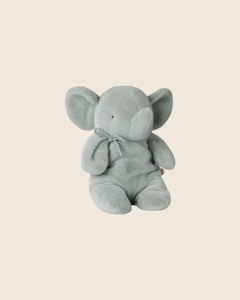 The PRE-ORDER: Maileg Elephant Plush, Medium in Soft Mint features large ears and a small ribbon around its neck, sitting upright against a plain beige background. Estimated arrival is early September.