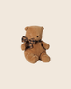 The PRE-ORDER: Maileg Teddy Bear Plush, Small - Mushroom sits upright against a light beige background, featuring soft plush fur and a large plaid bow. Estimated arrival is early October.