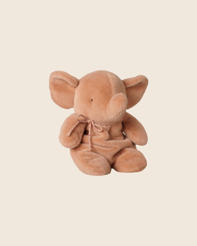 The PRE-ORDER: Maileg Elephant Plush, Medium - Vintage Rose sits upright with large ears and a small ribbon around its neck against a beige background. Estimated arrival early September.