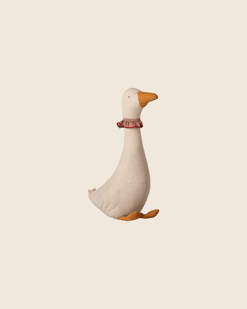 The PRE-ORDER: Maileg Goose, Small - Dark Nature (Estimated Arrival Mid September) features a plush toy goose with a white body, orange beak and feet, plus a red ruffled collar—ideal as a charming decoration or festive Christmas accent.