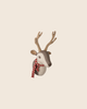 The PRE-ORDER: Maileg Trophy Deer - Light Nature features beige antlers, a gray and white face, and a red-striped scarf on a round base with a fabric loop—ideal as a delightful wall decor piece. Estimated arrival mid November.
