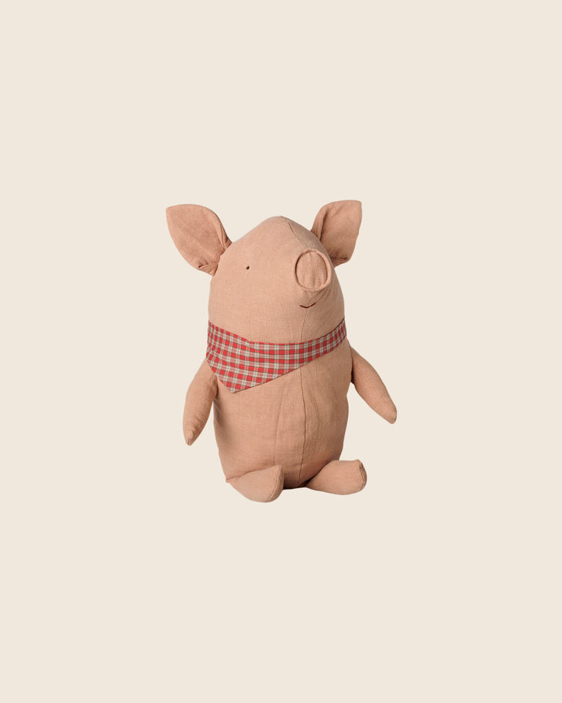The PRE-ORDER: Maileg Truffle Pig, Big - Powder is a soft, light brown plush toy with a checked scarf around its neck, sitting upright against a plain beige background. Estimated arrival: mid November.