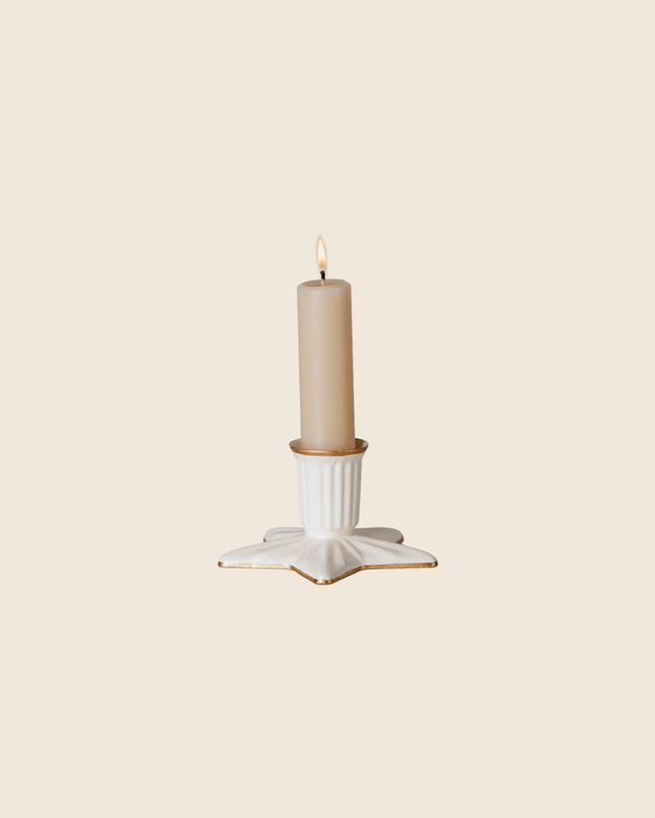 A PRE-ORDER: Maileg Christmas Candle Holder, Star, Large features a beige candle in a white star-shaped ceramic holder with handpainted gold details, shown against a plain light background. Estimated arrival: early September.