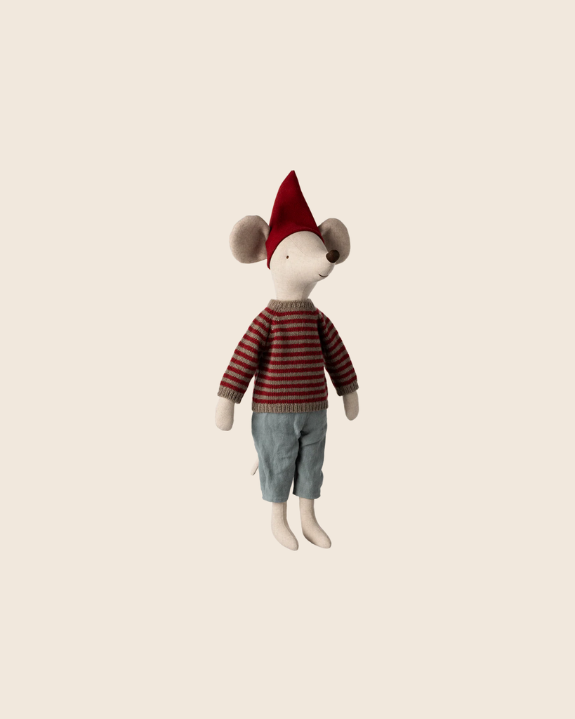 The PRE-ORDER: Maileg Christmas Mouse, Maxi - Boy stands upright in a red pointed hat, red and gray striped sweater, and light blue pants against a plain beige background. Linen cotton plush. Estimated arrival early September.
