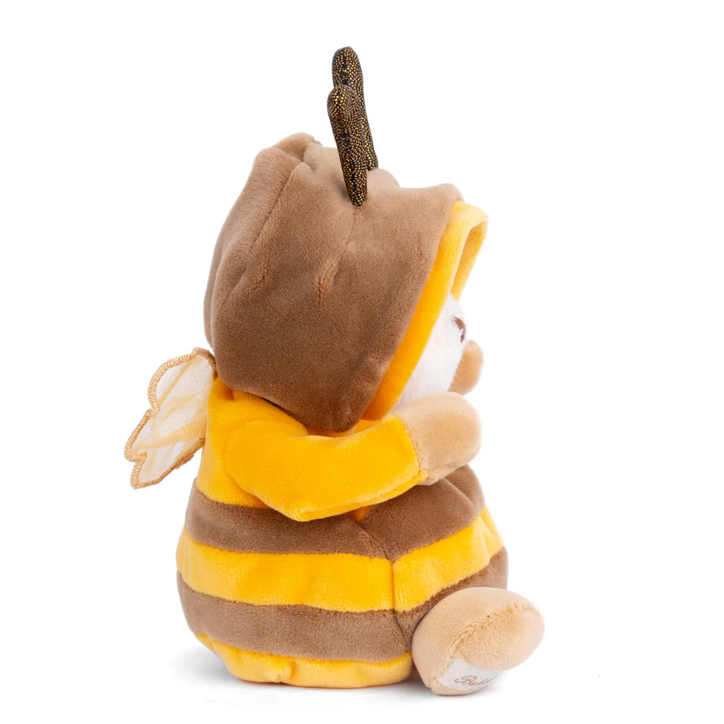 Bukowski - Ziggy Bee plush sits upright in a yellow and brown striped bee costume with hood, wings, and antenna, shown from the side on a white background.