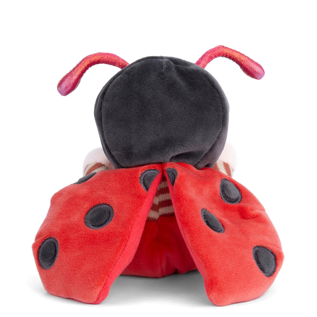 The Bukowski - Ziggy Ladybug plush toy is shown from the back, displaying its red wings with black spots, a black head, and two pink antennae against a white background.