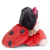 The Bukowski - Ziggy Ladybug is a plush bear in a ladybug costume with red wings, black spots, a black hood, and a red bow, shown sitting on a white surface facing away from the camera.