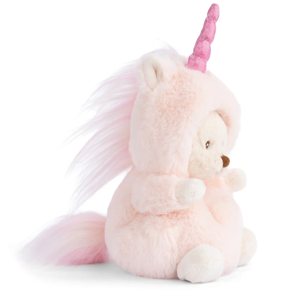 Meet Bukowski's Ziggy Unicorn: a plush teddy bear dressed in a soft pink unicorn costume, featuring a shiny pink horn, white paws, and a long pink mane and tail, sitting upright facing right.