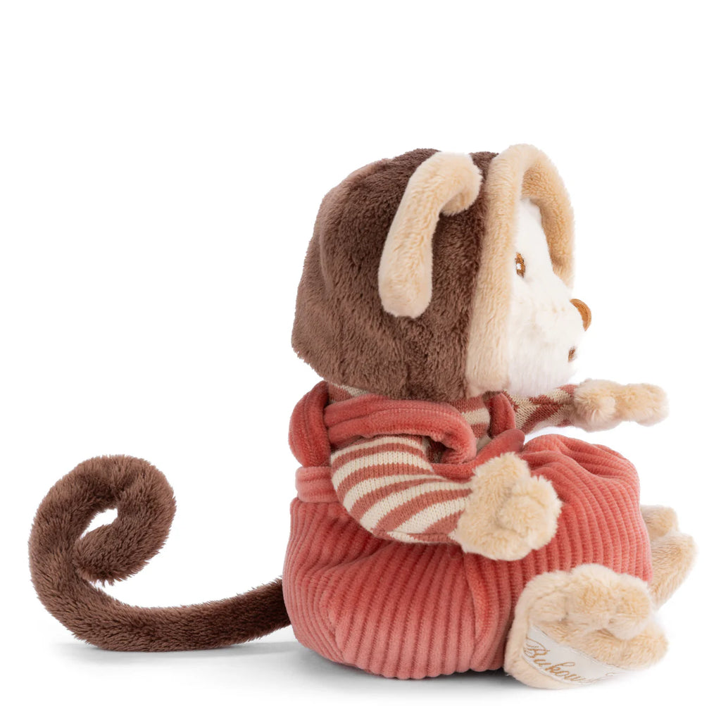 Bukowski - Ziggy Winston Monkey is a collectible stuffed toy featuring a brown hood with floppy ears, a pink outfit with striped sleeves, a curled tail, and cream-colored face, hands, and feet.