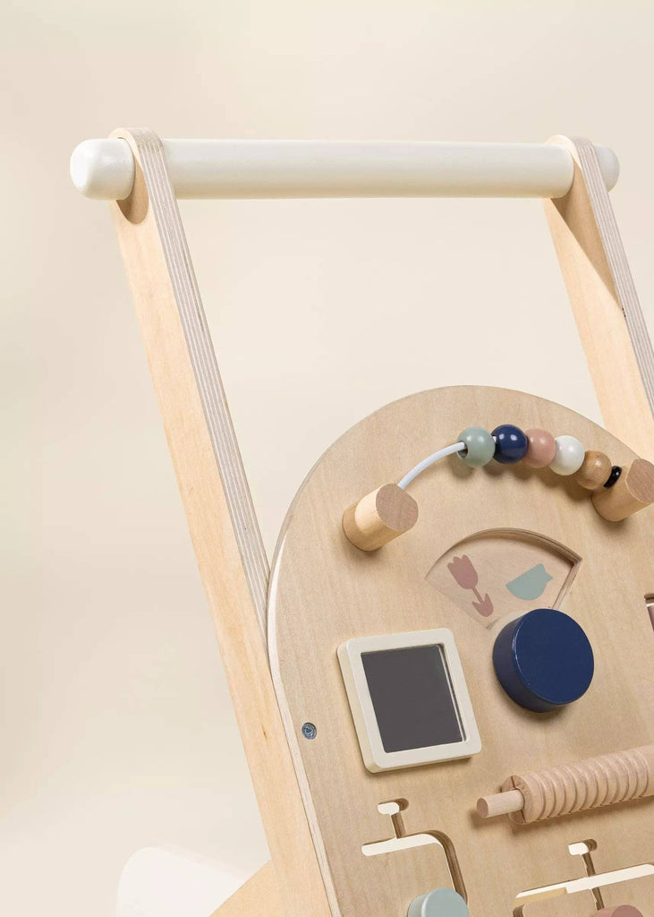 The Wooden Activity Walker features a white handle, colorful beads, spinning gears, a small chalkboard, and simple illustrations on the front panel—making it perfect for little ones discovering sensory toys. Set against a neutral background.