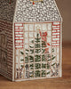 The Coral & Tusk Home for the Holidays Tissue Box Cover features an embroidered house wall with a large window, a festive tree, a red cat placing a star on top, and two smaller animals—crafted in fine detail to add holiday cheer.