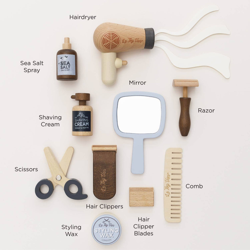 The Wooden Hairdresser & Barber Kit (ships in one week) is a plastic-free, wooden grooming set with barber tools like a hairdryer, mirror, razor, sea salt spray, shaving cream, scissors, clippers, styling wax, blades, and comb.
