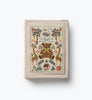 The Storybook Embroidered Small Photo Album, covered in fabric and adorned with delightful embroidered motifs—including a bear, trees, swans, giraffes, flowers, a house, and alphabet blocks—graces the cover. This distinctive 4x6 album is shown against a simple white background.