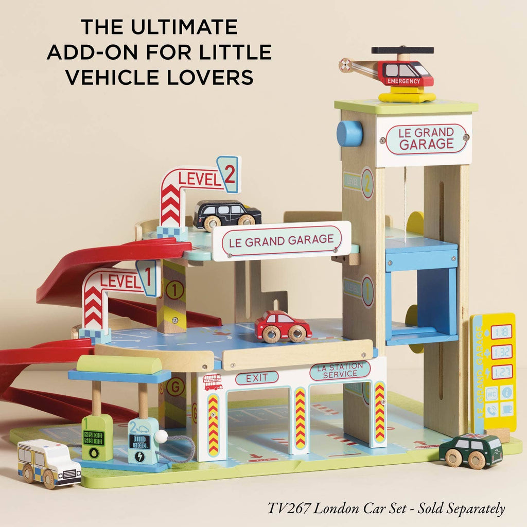 The Le Grand Wooden Garage features ramps, levels, signs, mini cars, and a rooftop helicopter to inspire imaginative play. Perfect for vehicle fans. Add the TV267 London Car Set (sold separately) for even more fun!.