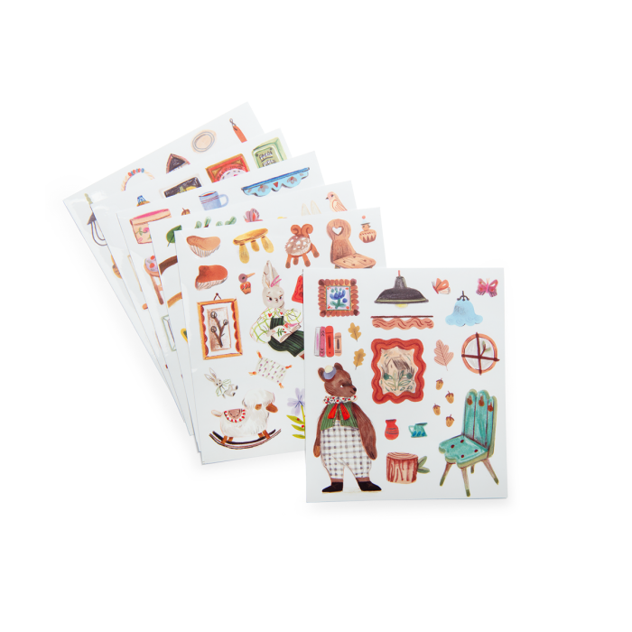 The Moulin Roty Coloring Book with Stickers - The Minouchkas includes five sticker sheets with whimsical illustrations—animals, furniture, frames, and more—on a white background, ideal for decorating your planner or coloring book.
