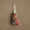 The Coral & Tusk Fox Tree Trimmer Ornament is a small, fabric Christmas ornament shaped like a fox, embroidered in orange, white, and black on beige, with a white ribbon loop—perfect for holiday gifting or decorating your tree.