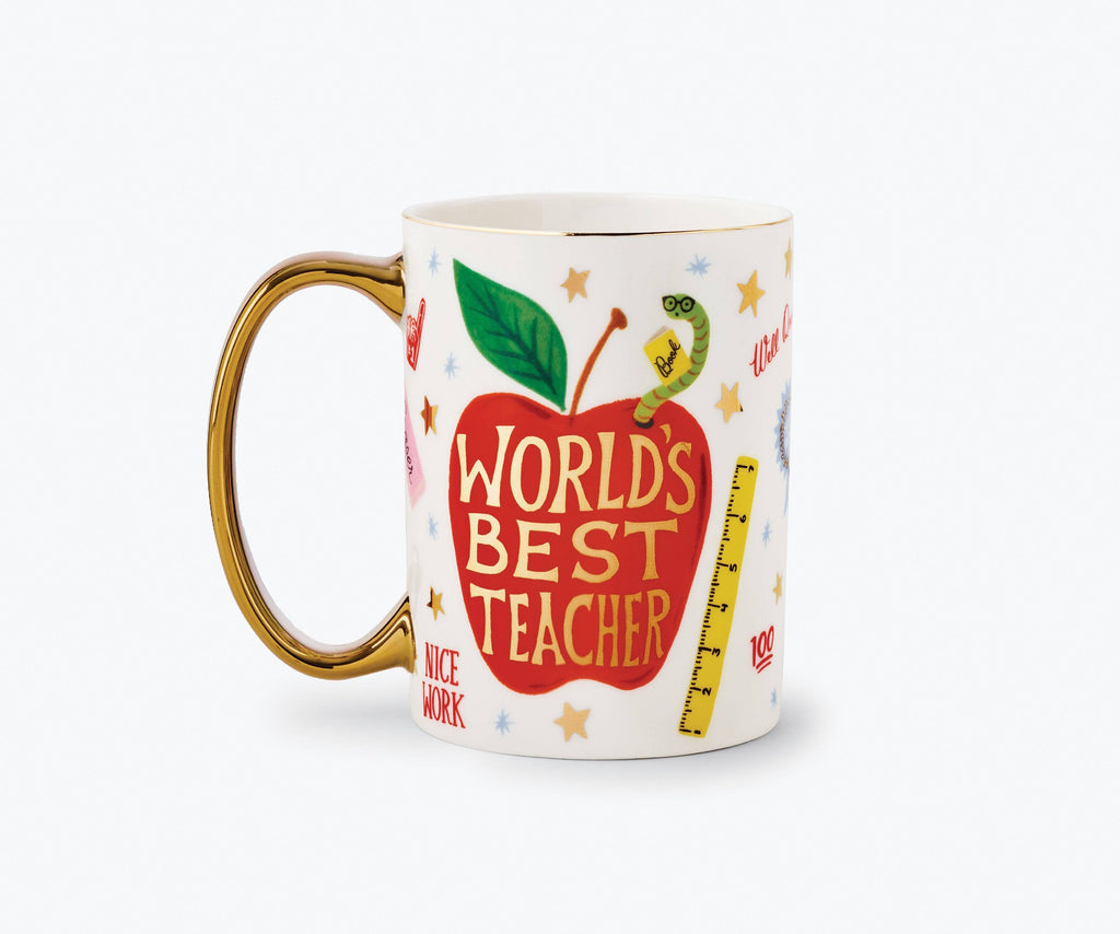 Introducing the World’s Best Teacher Porcelain Mug: a white porcelain mug adorned with a gold handle and gold accents, featuring a bold “WORLD’S BEST TEACHER” message. The design includes a large red apple, ruler, stars, and charming illustrated school-themed doodles like “NICE WORK,” making it the perfect gift to celebrate your favorite educator.
