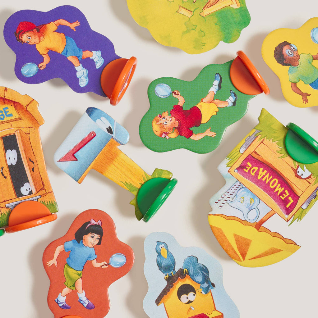 Assorted Clue Jr. Vintage Bookshelf Edition board game pieces featuring illustrations of children with magnifying glasses, a mailbox, and a lemonade stand.