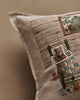 A close-up of the Coral & Tusk Three Little Bears Pocket Pillow, featuring embroidered bears tucked in bed, a tree outside their window, and cozy details in earthy tones—a charming pillow inspired by Goldilocks and the Three Bears. Ships in one week.
