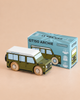 A green and white classic wooden toy car stands beside its blue box, labeled “No. 27 GT150 Archie | Made in England,” which displays playful illustrations, limited edition markings, and promises hours of imaginative play.