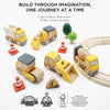The Construction Toy Cars, Trucks & Diggers set includes vehicles, signs, trees, cones, and curved tracks—perfect for imaginative play. Promotes sustainability. Ships in one week. Displayed on a white background.