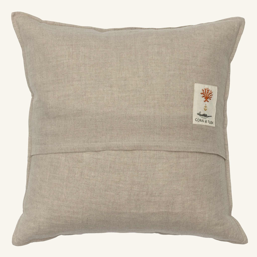The Christmas Donkey Pillow is a square, light beige linen pillow with a horizontal seam and a small fabric tag—perfect for festive holiday decor or adding charm to your Christmas toy basket.