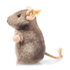 The Steiff Piff Mouse Plush Toy, 4 inches, features soft brown and beige fur, pink ears and paws, a long beige tail, and a yellow ear tag. This adorable plush is sitting upright and facing left.