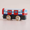 The No. 48 GT290 Tim, made in England, is a wooden toy train car adorned with red, white, and blue painted details. Featuring four wooden wheels and metallic connectors on both ends, it invites imaginative play as children explore the world of metro transport on a light surface.