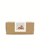 A plain brown rectangular box with a white label featuring an illustration of a lion driving a red car, inspiring imagination and open-ended play with the Sabo Concept First Journey.