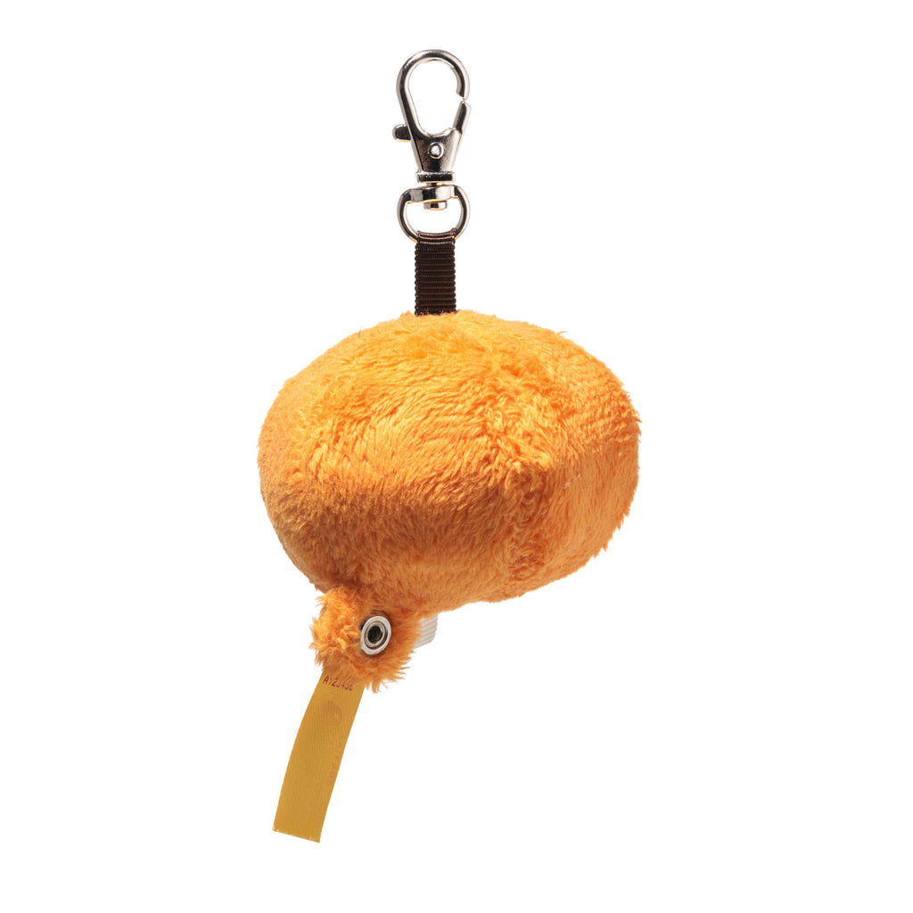 The Steiff Little Pumpkin Keychain is a round, orange plush keyring featuring a metal clasp and a small yellow tag at the bottom—an adorable accessory for Halloween.