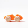 Grimm's Colored Wooden Cars: A simple wooden toy car with a bright orange body and natural wood wheels, inspired by Grimm's Cars, displayed on a white background.