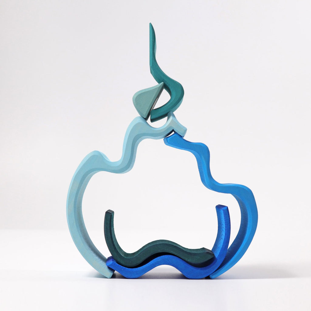 Discover Grimm's Ocean Waves, an abstract sculpture crafted from lime wood that showcases flowing, interlocking curves in a dynamic, fluid form. This piece features various shades of blue and teal set against a white background, evoking the essence of swirling waves or tendrils reminiscent of Waterwave artistry.