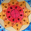 Grimm’s Sparkling Mandala Sun Creative Puzzle arranged in a circular mandala pattern with red, orange, and yellow wooden blocks embedded with colorful faceted gems.